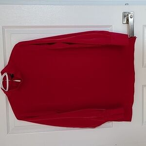 Red velvet blouse.